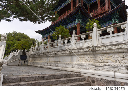 Beautiful architecture of Dongba Culture Research Institute at Black Dragon Pool Park in Lijiang Old Town, China. 138254076