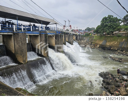 An aerial drone perspective reveals the historic Katulampa Dam spanning the Ciliwung River in Bogor An aerial drone perspective reveals the historic Katulampa Dam spanning the Ciliwung River in Bogor 138254198