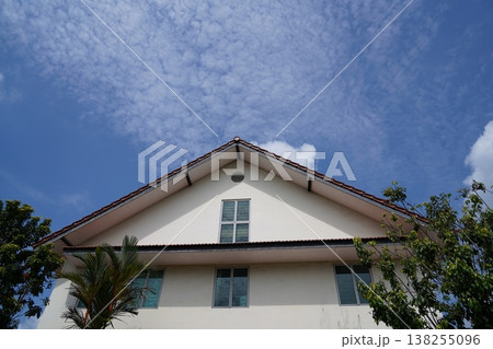 House Exterior Under Blue Sky with Clouds Day Time Shot House Exterior Under Blue Sky with Clouds Day Time Shot 138255096