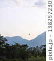 a rising hot air balloon  138257230