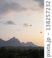 A number of hot air balloons floating 138257232