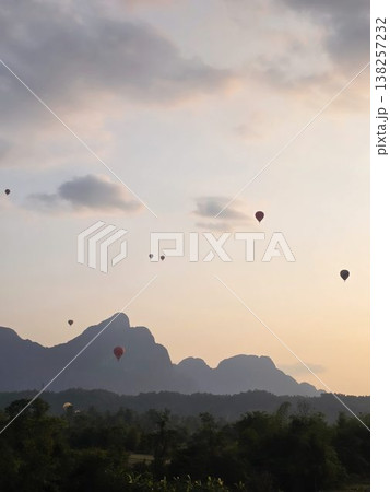 A number of hot air balloons floating A number of hot air balloons floating 138257232