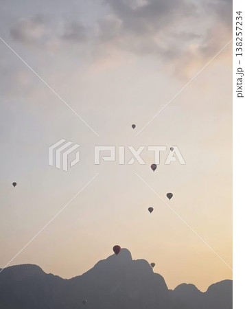 Evening of a rising hot air balloon 138257234