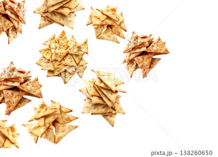 Assorted piles of potato chips isolated on white background illustrating snack food concept idea 138260650