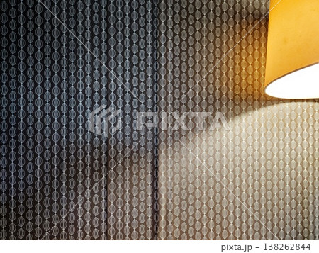 Warm yellow lampshade with vintage wall background. Warm yellow lampshade with vintage wall background. 138262844