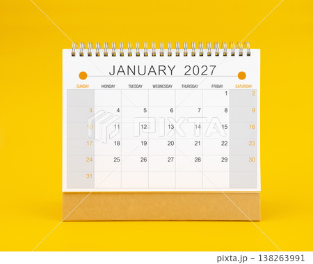 January 2027 desk calendar on yellow color background, Front view. January 2027 desk calendar on yellow color background, Front view. 138263991