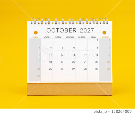 October 2027 desk calendar on yellow color background, Front view. October 2027 desk calendar on yellow color background, Front view. 138264000
