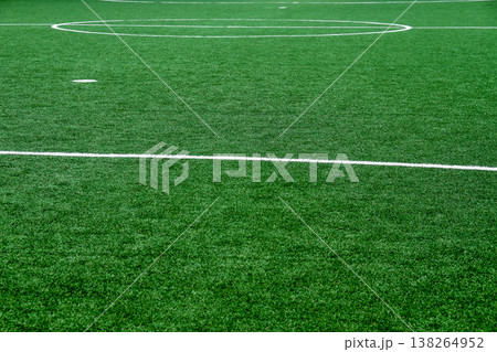 Soccer field with green grass and white line 138264952