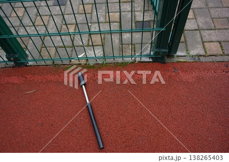 Compact bicycle pump lies on sport ground Compact bicycle pump lies on sport ground 138265403