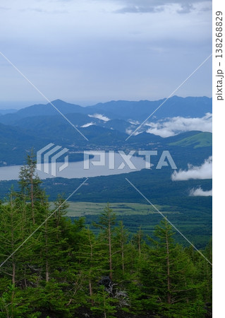 Reflections Of Emerald Forest And Blue Peaks 138268829