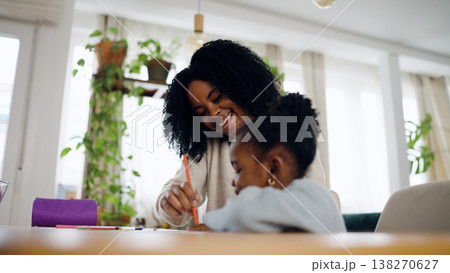 African American mother and daughter drawing together at home 138270627