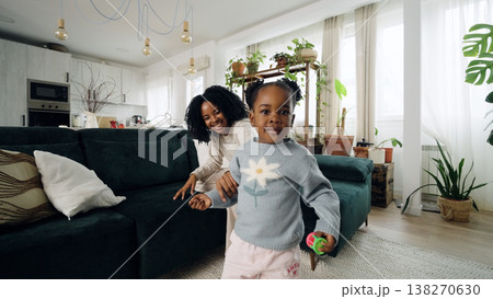 Happy Black family mother and daughter bonding indoors 138270630