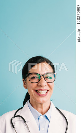Smiling woman doctor wearing glasses and stethoscope Smiling woman doctor wearing glasses and stethoscope 138270997