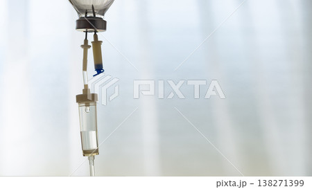 Health care background of IV drip chamber closeup with copy-space 138271399