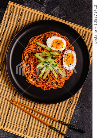 Korean traditional food, cucumber and boiled egg cold spicy noodles. 138271412