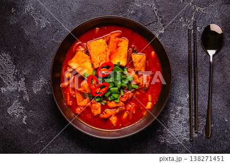 Korean traditional food, spicy kimchi soup (kimchi tige) with pork and tofu cheese. Korean traditional food, spicy kimchi soup (kimchi tige) with pork and tofu cheese. 138271451