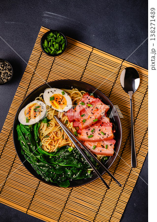Traditional ramen noodle soup with brisket, spinach and egg. 138271489