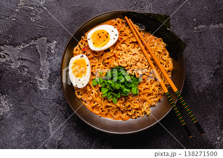 Korean style instant noodle, Shin Ramyeon with peanut and egg. Korean style instant noodle, Shin Ramyeon with peanut and egg. 138271500