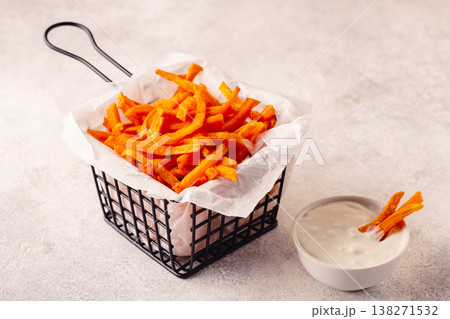 Sweet potato fries with blue cheese sauce. Sweet potato fries with blue cheese sauce. 138271532