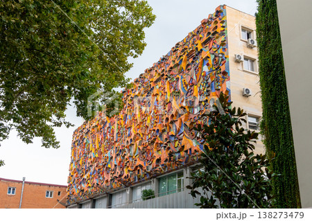 Colourful mosaic facade of Auditorium of the industrial technical college in Tbilisi, Georgia 138273479