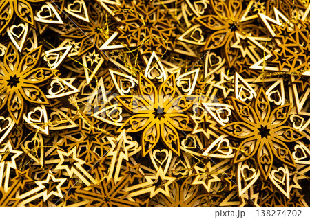 Eco-friendly Christmas decorations made of natural wood, wooden snowflake ornaments. 138274702