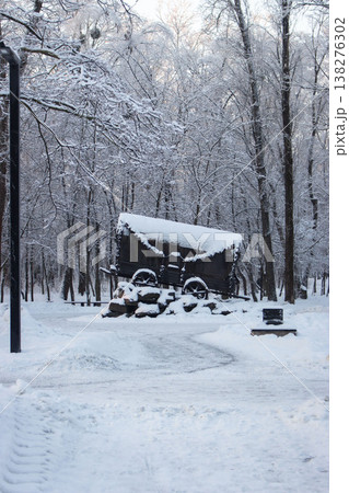 Kiev, Ukraine - 01/16/2026: Holocaust memorial in park called Babyn Yar, Kiev. Old wagon with bullet holes in winter forest. Monument of gypsy victims in World War 2. Genocide history. Silent sadness. 138276302