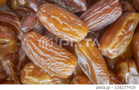 Close up of dried tasty dates, selective focus. Close up of dried tasty dates, selective focus. 138277420
