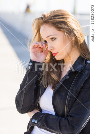 Sad woman walking outdoor Sad woman walking outdoor 138280072