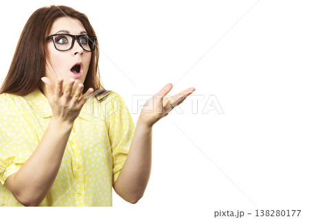 Shocked amazed woman gesturing with hands 138280177