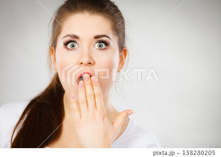 Shocked amazed woman covering mouth with hands 138280205