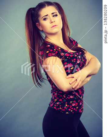 Young teenage woman being offended got the hump Young teenage woman being offended got the hump 138280209