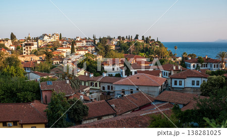 Colorful Rooftops and Coastal Views in a Mediterranean Town During Sunset 138281025