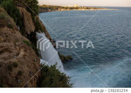 Stunning Waterfall Cascading Into the Mediterranean Sea Near Antalya, Turkey During Sunset Stunning Waterfall Cascading Into the Mediterranean Sea Near Antalya, Turkey During Sunset 138281254