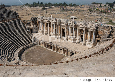 Pamukkales Ancient Ruins Showcase Historical Architecture and Stunning Landscapes in the Backdrop of a Clear Blue Sky Pamukkales Ancient Ruins Showcase Historical Architecture and Stunning Landscapes in the Backdrop of a Clear Blue Sky 138281255