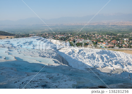 Explore Pamukkales Stunning Travertine Terraces and Surrounding Landscape in a Bright and Serene Morning Setting 138281256