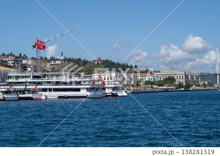 Bosphorus Waterfront With Boats and Landmarks Under a Clear Sky in Istanbul, Detailed View of the Vibrant Landscape and Architectural Features Bosphorus Waterfront With Boats and Landmarks Under a Clear Sky in Istanbul, Detailed View of the Vibrant Landscape and Architectural Features 138281319