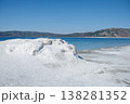 Salt Formations Contrast With Blue Waters and Clear Skies at a Coastal Location During Daytime 138281352
