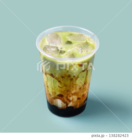 Matcha milk tea with tapioca pearls in plastic cup Matcha milk tea with tapioca pearls in plastic cup 138282423