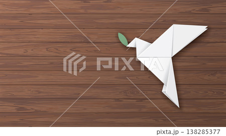 3D white origami peace dove with olive leaf on wooden background have blank space. 3D white origami peace dove with olive leaf on wooden background have blank space. 138285377