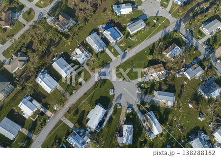 Badly damaged mobile homes after hurricane Ian in Florida Southwest region residential area. Consequences of natural disaster Badly damaged mobile homes after hurricane Ian in Florida Southwest region residential area. Consequences of natural disaster 138288182