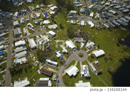 Badly damaged mobile homes after hurricane Ian in Florida residential area. Consequences of natural disaster 138288184