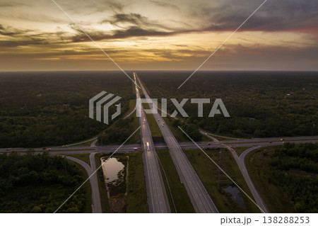 American highway bridge with fast moving traffic in evening. Interstate transportation concept 138288253