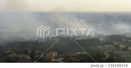 Aerial view of strong wildfire burning severely in North Port city, Florida. Natural disaster during dry season in jungle woods Aerial view of strong wildfire burning severely in North Port city, Florida. Natural disaster during dry season in jungle woods 138288318
