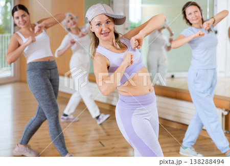 Dance group teaches hip hop dance in dance studio 138288494