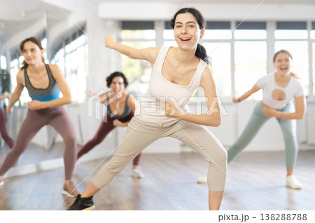 Funk jazz dancers practicing dance moves in studio 138288788