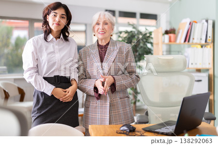 Young and elderly women working together in office 138292063