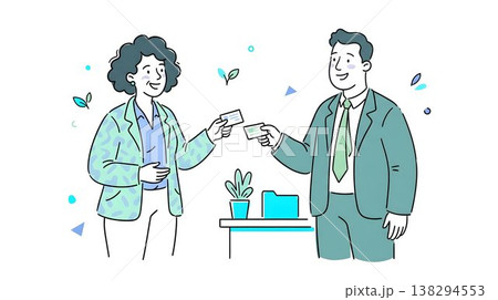 笑顔で丁寧に名刺交換をするビジネスパーソン 138294553