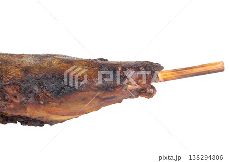 Grilled catfish on a white background thai head closeup Grilled catfish on a white background thai head closeup 138294806