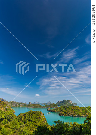 Tropical seascape of Mu Ko Ang Thong Marine Park islands in Thailand with emerald water, limestone formations and clear blue sky, panoramic view of famous national marine park near Ao Nang 138295961