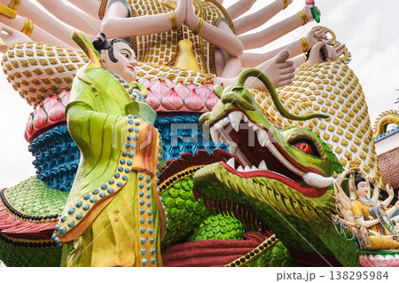 Close-up of colorful guardian figure and dragon statue at Plai Laem temple Koh Samui Thailand 138295984